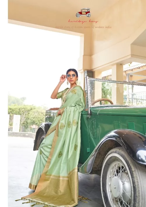 Enchanting pastel green tissue silk saree