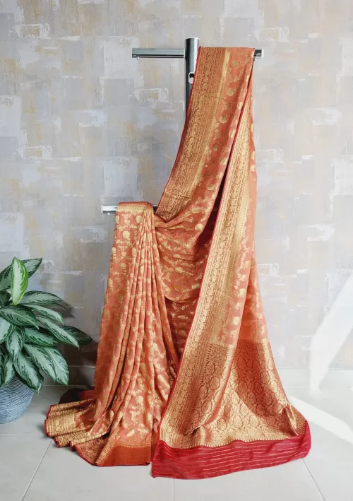 Pure georgette khaddi jaal banarasi saree in rouge peach