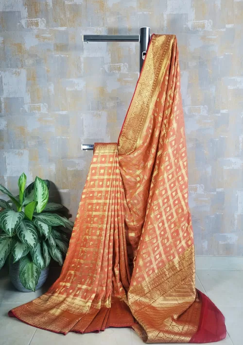 Pure georgette khaddi jaal banarasi saree in fig peach